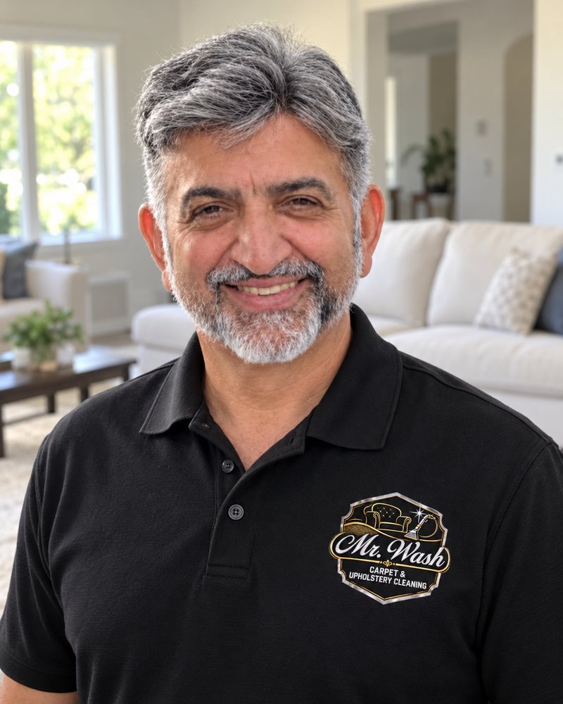 Joao Correa, owner of Mr. Wash Carpet & Upholstery Cleaning, in a black Mr. Wash polo
